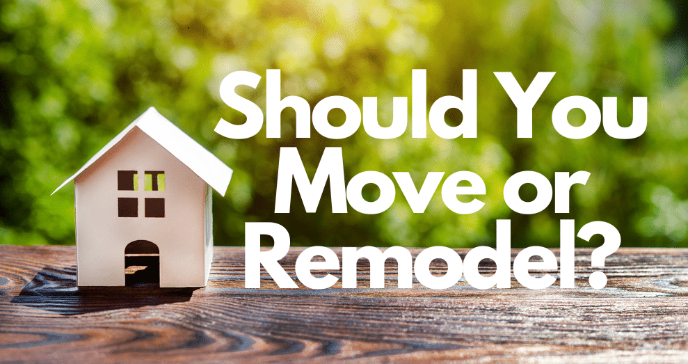 Small wood house concept. Green Tree Background. Words "Should you move or remodel?"